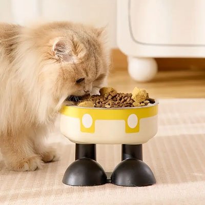 gamelle chat surelevee en forme de bonhomme jaune